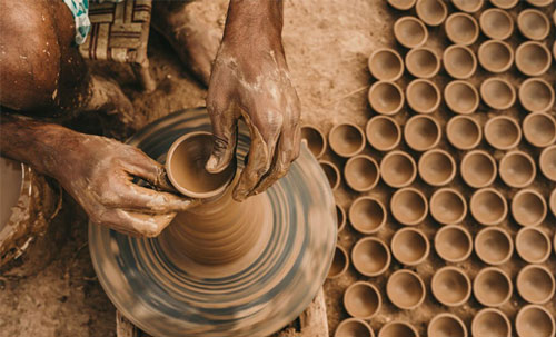 Hands shaping wet clay pottery wheel, Traditional Doll Temple Pondicherry, Guide at Life of Pi movie location, Local artisan weaving fabric Pondicherry, Pondicherry Cultural Tour, Pottery Experience Pondicherry, Life of Pi Location Pondicherry, Pondicherry Village Tour, Pondicherry Cultural Tour, Pottery Experience, Life of Pi, Pondicherry Artisan, Village Tour, Travel Pondy