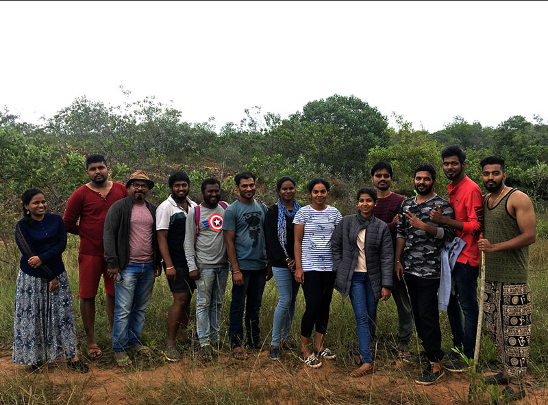 Hiker observing spider web sacred grove, Group on guided Nature Trek in Chennai, Butterfly on leaf close-up Chennai, Lush green forest trail near Chennai, Nature Trek in Chennai, Guided Nature Walk Chennai, Trekking near Chennai, Sacred Grove Chennai, Nature Trek in Chennai, Chennai Trekking, Sacred Grove, Guided Walk, Micro Adventure, Chennai Outdoors