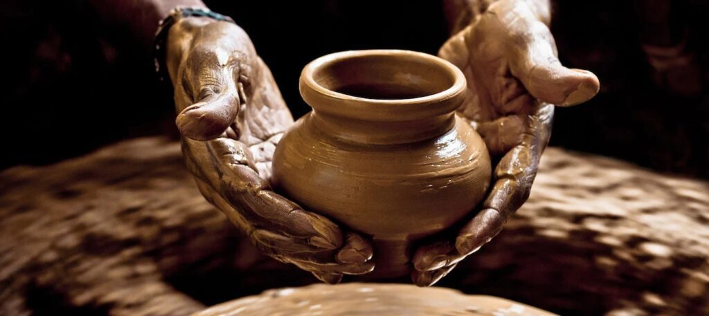 Hands shaping wet clay pottery wheel, Traditional Doll Temple Pondicherry, Guide at Life of Pi movie location, Local artisan weaving fabric Pondicherry, Pondicherry Cultural Tour, Pottery Experience Pondicherry, Life of Pi Location Pondicherry, Pondicherry Village Tour, Pondicherry Cultural Tour, Pottery Experience, Life of Pi, Pondicherry Artisan, Village Tour, Travel Pondy